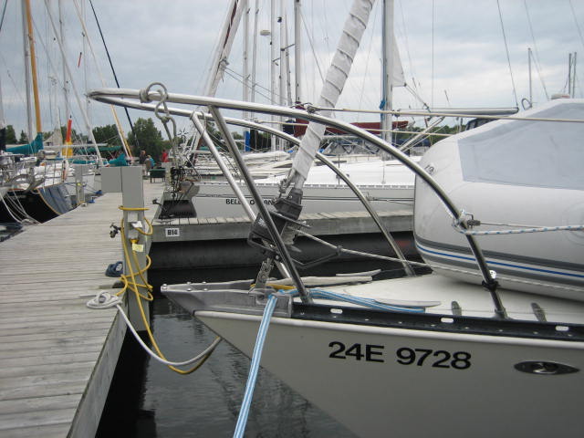 Stainless steel bow rail and deck hardware on a yacht