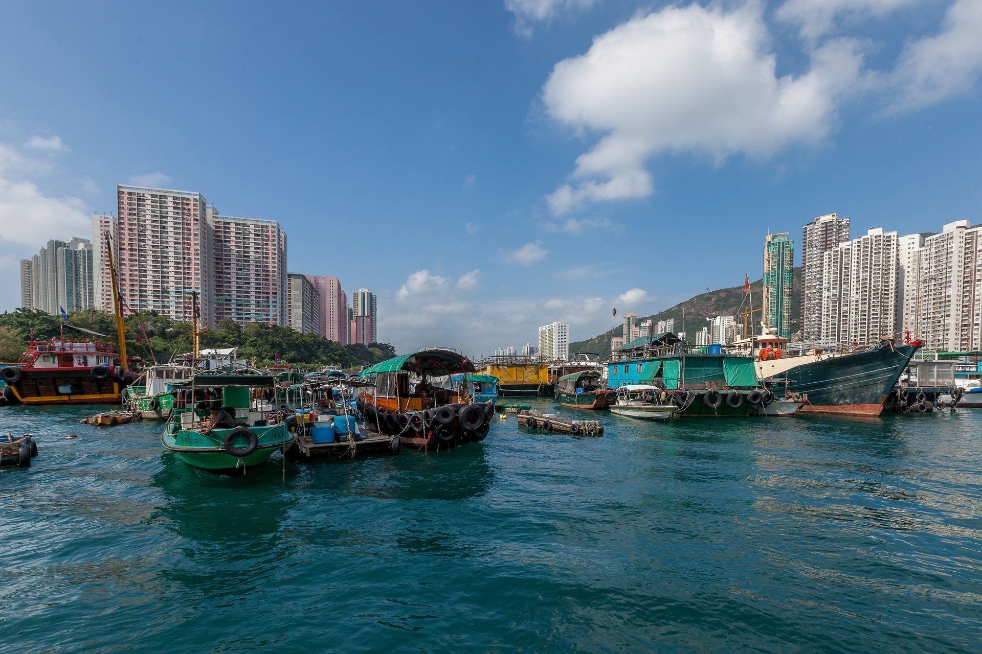 Hong Kong harbour with fishing boats and waterfront